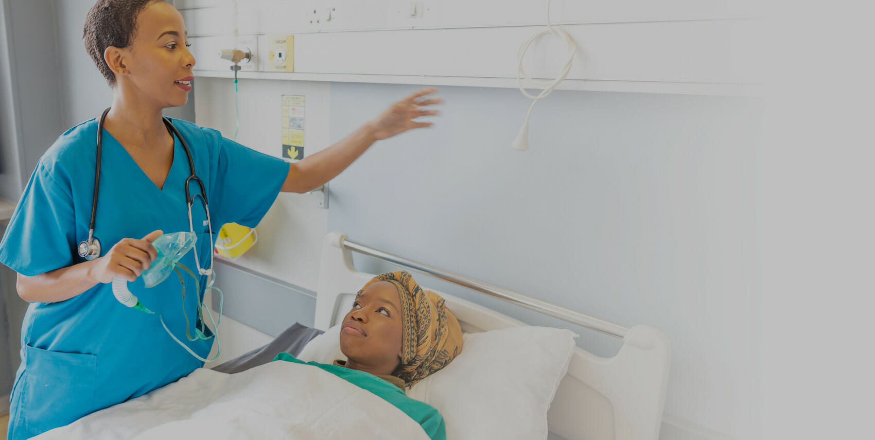 Image showing a respiratory therapist at work with a patient.